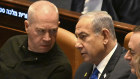 Prime Minister Benjamin Netanyahu speaks to Defence Minister Yoav Gallant at the opening of the 25th Knesset session on October 24.
