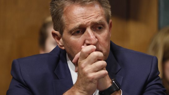 Flake makes dramatic intervention as Senate panel backs Kavanaugh