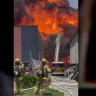 Worker missing after fire engulfs Melbourne paint factory