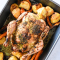 A large air fryer can accommodate a whole roast chicken and vegetables.