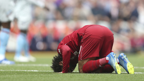 Liverpool's Mo Salah celebrates scoring his side's first goal against West Ham at Anfield on Sunday.