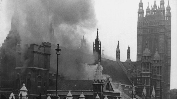 Smoke pours from Westminster Hall following a bomb in the House of Parliament.