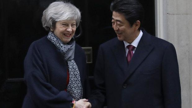 British Prime Minister Theresa May welcomes Japanese Prime Minister Shinzo Abe to Downing Street.