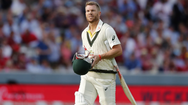 Gone: David Warner departs for three after being bowled by Stuart Broad.