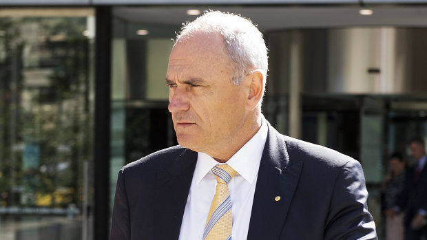 National Australia Bank Chairman Ken Henry leaves the Royal Commission into Misconduct in the Banking, Superannuation and Financial Services Industry at the Federal Court in Melbourne on Monday. 