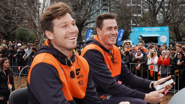 Toby Greene and Jeremy Cameron enjoy the grand final parade on Friday.