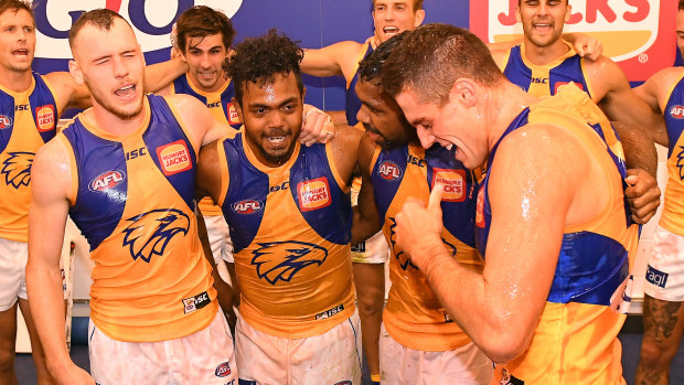 West Coast players - in their original 1987 colours - have changed their team song for the first time in the club's history.