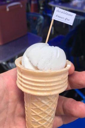 Thai volunteers, who have worked tirelessly all week to support the rescue effort, are handing out free coconut ice-creams. 