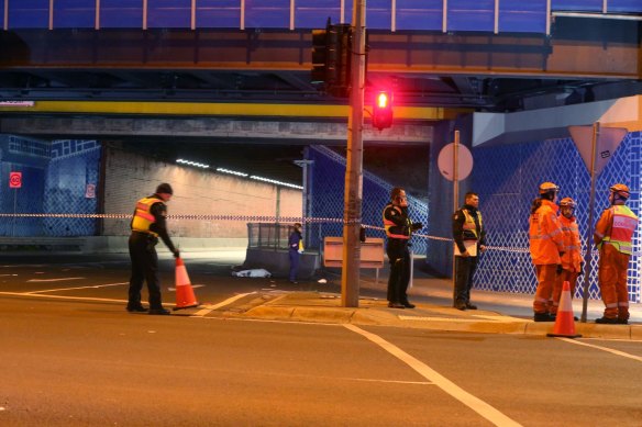Police and SES officers on the scene of the fatal stabbing at Tottenham station in August 2017.