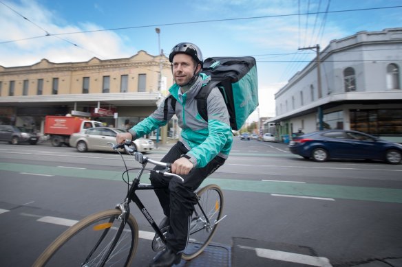 Former Deliveroo Australia CEO Levi Aron on his Deliveroo bike. 