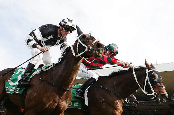 Adam Hyeronimus riding Wu Gok (right) to victory in the Winter Cup last month at Rosehill.