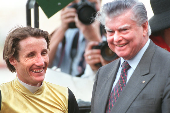 Winning history: Damien Oliver with Bart Cummings after winning the Cox Plate on Dane Ripper.