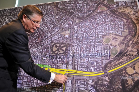 Then premier Denis Napthine announcing land acquisitions for the doomed East West Link in 2013.