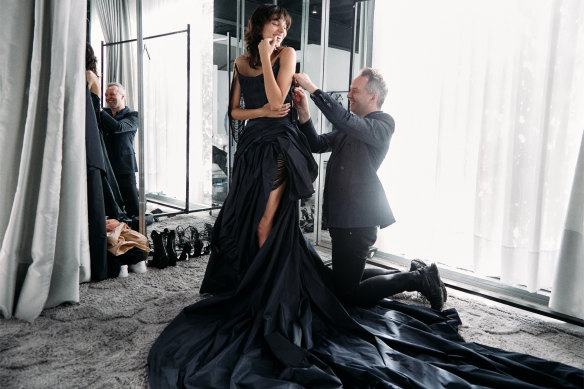 Fit for purpose … actor Charlee Fraser and designer Toni Maticevski with the dress that will be given a second life.