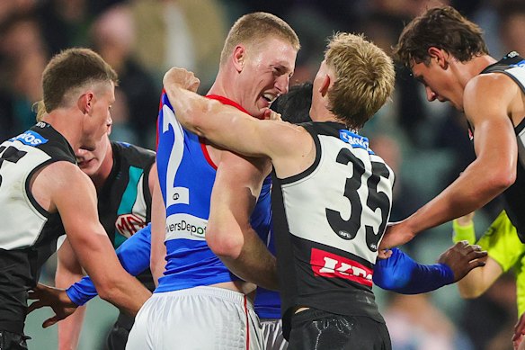 Joe Richards remonstrates with Jacob van Rooyen after the incident with Aliir Aliir.