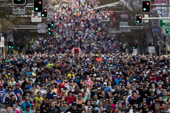 City2Surf Runners make their way along William Street during the 2019 event. This year, runners will take part in a virtual event. 