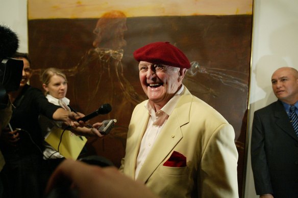 John Olsen with his Archibald Prize-winning work “Self-portrait Janus-faced”.