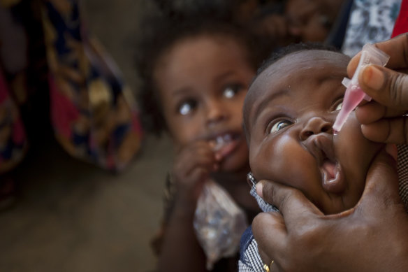 A baby receives a polio vaccine at the Medina Maternal Child Health Centre in Mogadishu, Somalia.