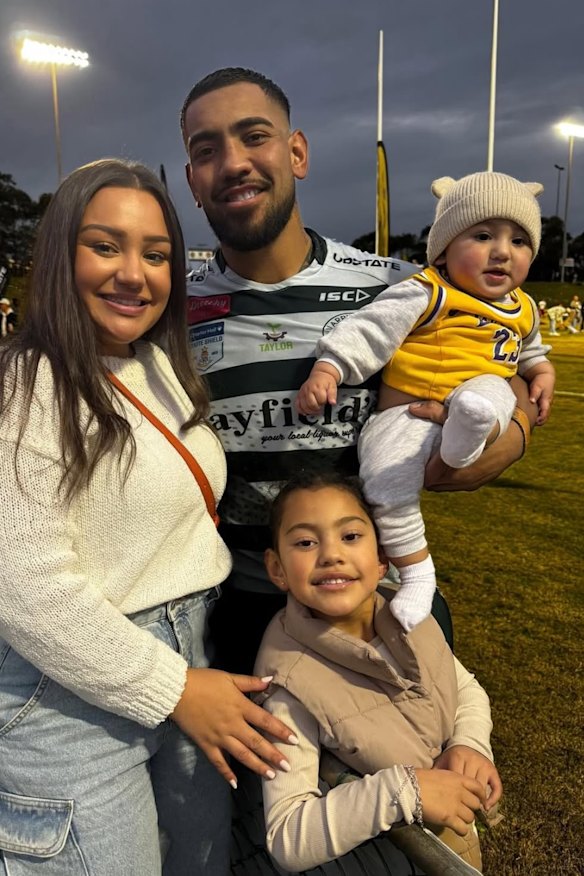 Warringah’s Wes Thomas with his young family.
