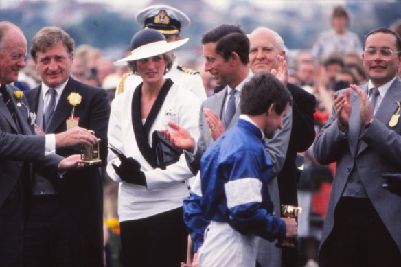 A royal affair ... Prince Charles (centre) and Princess Diana at the 1985 Melbourne Cup, flanked businessman John Elliott (second from left).