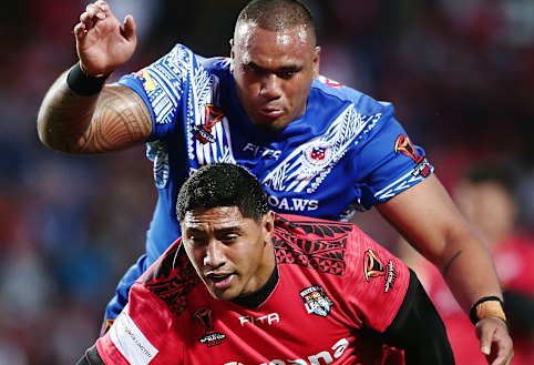Tonga’s Jason Taumalolo and Samoa’s Junior Paulo.