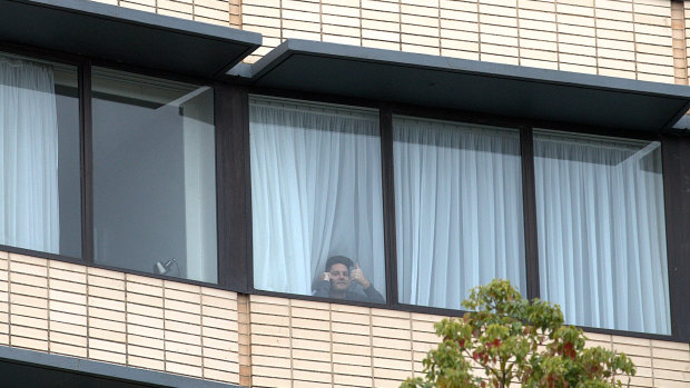 A traveller in quarantine at the airport Holiday Inn last year.