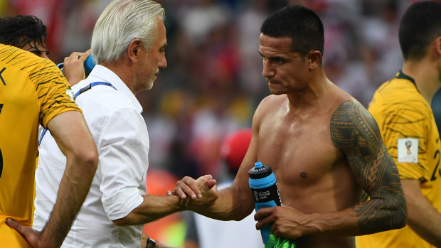 Golden oldie: Australia's Tim Cahill shakes hands with Head Coach Bert van Marwijk.