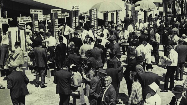 Punters crowd the betting ring at Randwick on Epsom Day in 1969.