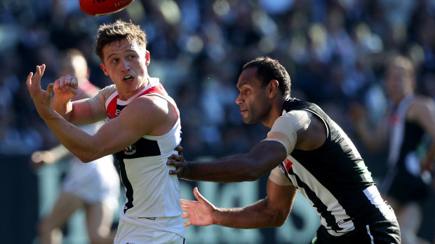 Travis Varcoe keeps tabs on Jack Billings.