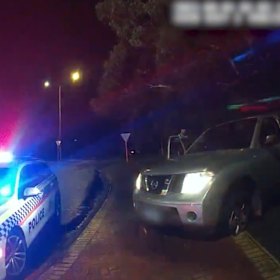 Police caught up with the Nissan when the 20-year-old driver crashed into a roundabout.