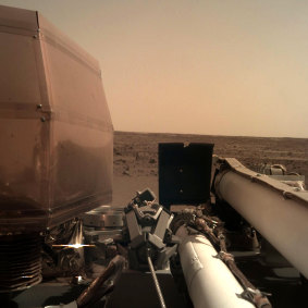 A photo sent back from NASA's InSight lander of the Martian surface, not long after it touched down early on Tuesday morning. 