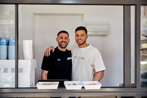  Kosta Kostidis (right) with his cousin’s husband, LaManna Supermarket CEO Patrick LaManna.