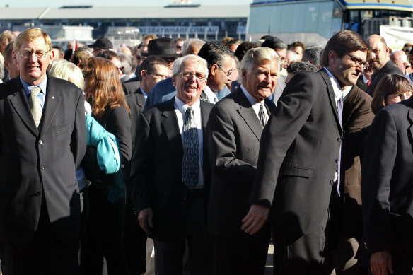 Combet (right) at union leader Tas Bull’s funeral service in 2003. (From left) former minister for trade and tourism Martin Ferguson, trade union leader John Coombs, and former prime minister Bob Hawke.  