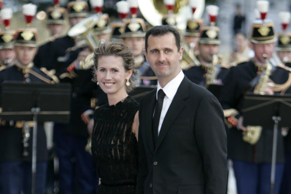Bashar and Asma al-Assad arrive for a formal dinner after summit in Paris, 2008.