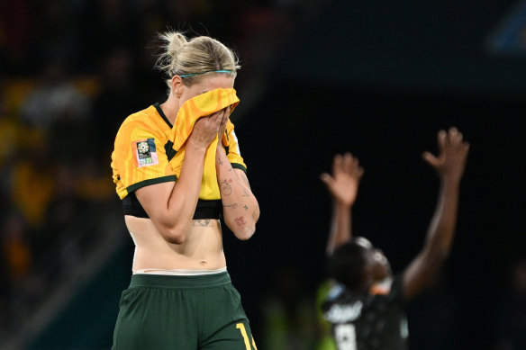 Alanna Kennedy takes a moment after the Matildas loss to Nigeria.