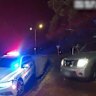 Police caught up with the Nissan when the 20-year-old driver crashed into a roundabout.