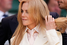 Kidman was a vision in beige as she stepped out in an incredibly chic Ralph Lauren suit teamed with a baby pink tie for the 2026 men’s finals. 
