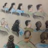 The 14 defendants in the trial over the death of Elizabeth Struhs, all members of a fringe religious group, appear in a Brisbane court. 