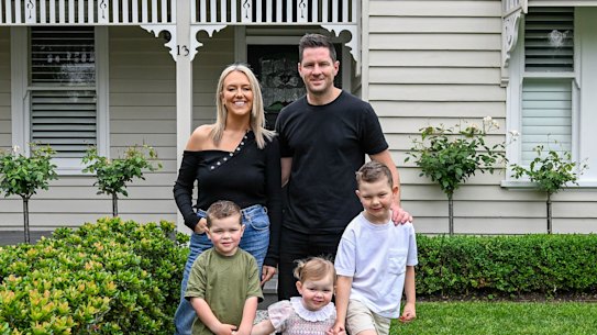 Gemma Sampson and Dale Cheesman with their children Hugo, Angus and Stella at the home they just sold in Carnegie.
