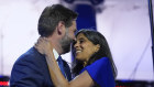 J.D. Vance and his wife, Usha Chilukuri, on stage at the convention.