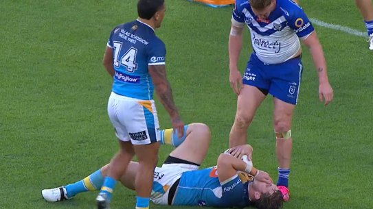 Dylan Napa shouts at Jarrod Wallace during the Titans-Bulldogs game.