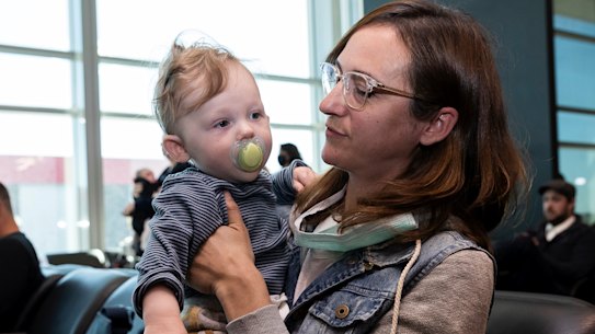Nine Lacy and her eight-month-old son, Luca, have flown to meet her husband's family in Adelaide. 