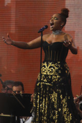 Jennifer Hudson performs with the New York Philharmonic orchestra at We Love NYC.