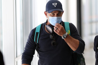 Justin Langer arrives at Perth Airport on Saturday after resigning as Australian cricket head coach.