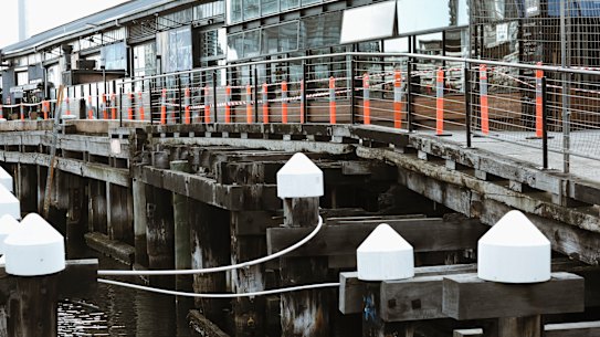 Businesses at the damaged Central Pier are suing Development Victoria for $100 million. 