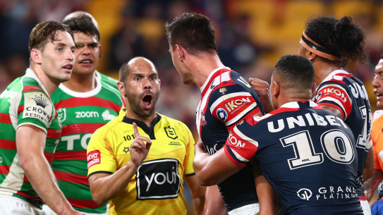 Roosters centre Joseph Manu confronts South Sydney’s Latrell Mitchell after the hit that broke his cheekbone.