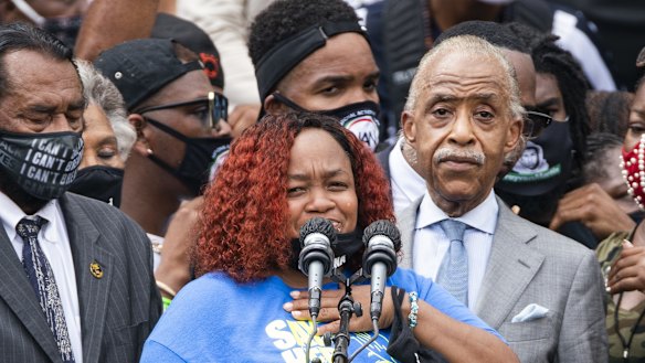 Tamika Palmer reacts while speaking about her daughter Breonna Taylor, who police shot in her apartment in Kentucky, during the "Get Your Knee Off Our Necks". 