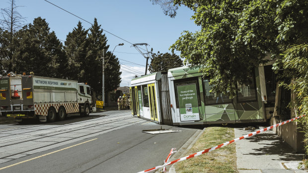 Cotham Road in Kew was closed after a tram derailed and smashed through a fence.  