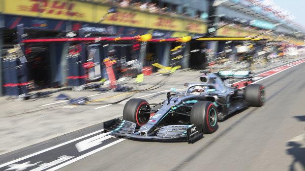 Mercedes' Lewis Hamilton enters pit lane in Melbourne.