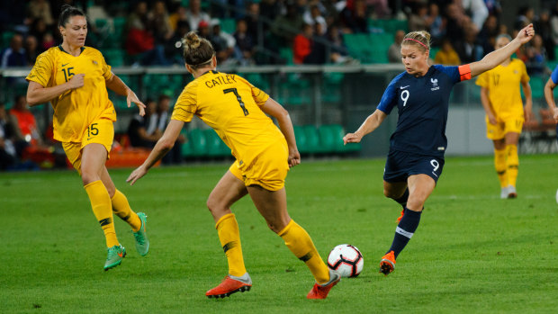 Brace: Double goal-scorer Eugénie Le Sommer launches a shot at the Matildas' goal.
